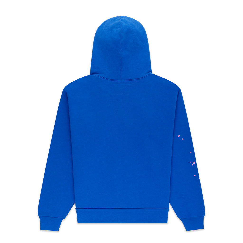 Back of a royal blue fleece hoodie with pink scattered star print on the left sleeve.
