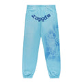 Light blue cotton fleece sweatpants with "SP5DER" text at crotch and a white spray web design on the right leg.