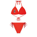 Red stretch nylon jersey bikini set with rope ties and crest graphic on top.