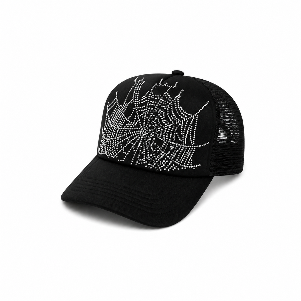 Black snapback hat featuring a silver rhinestone web graphic design, curved brim, and breathable mesh back panels.