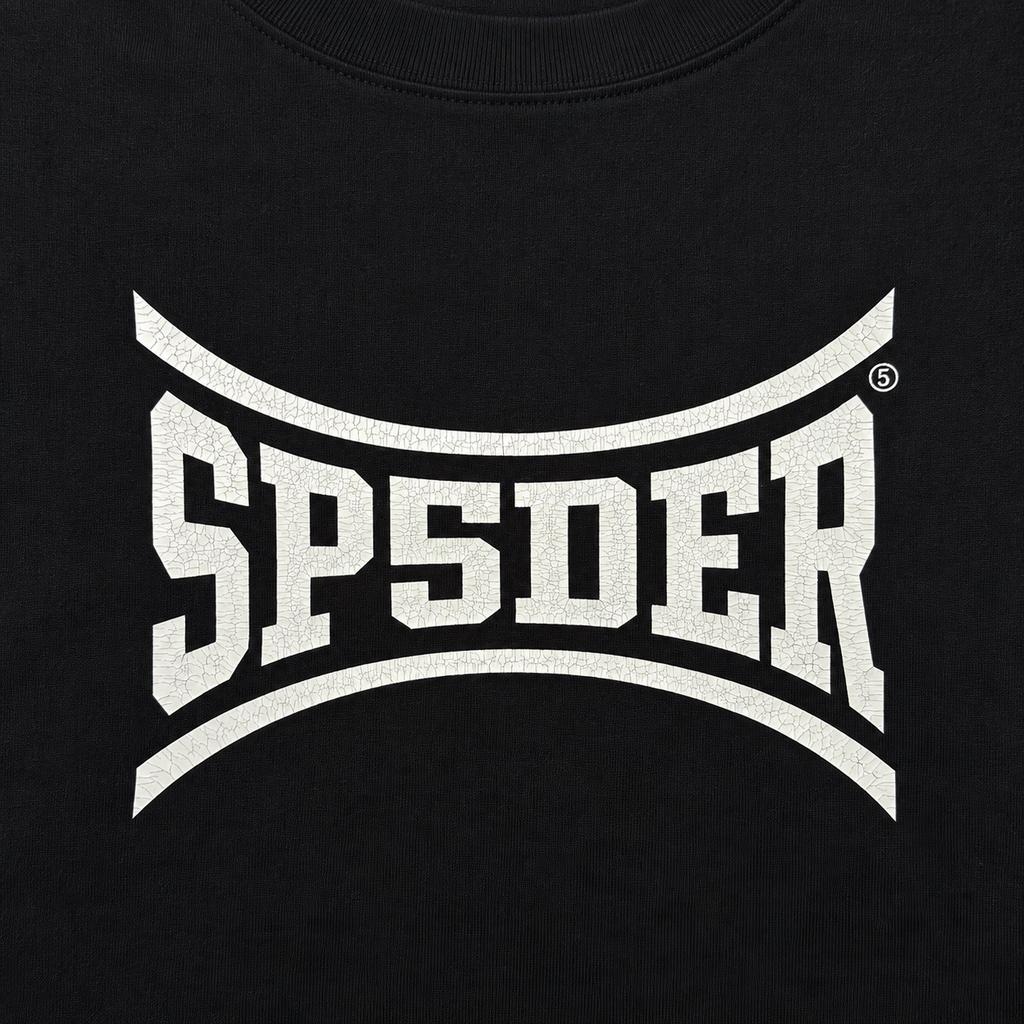 Black cotton undershirt featuring a white SPSDER logo with a distressed, cracked-effect graphic print.