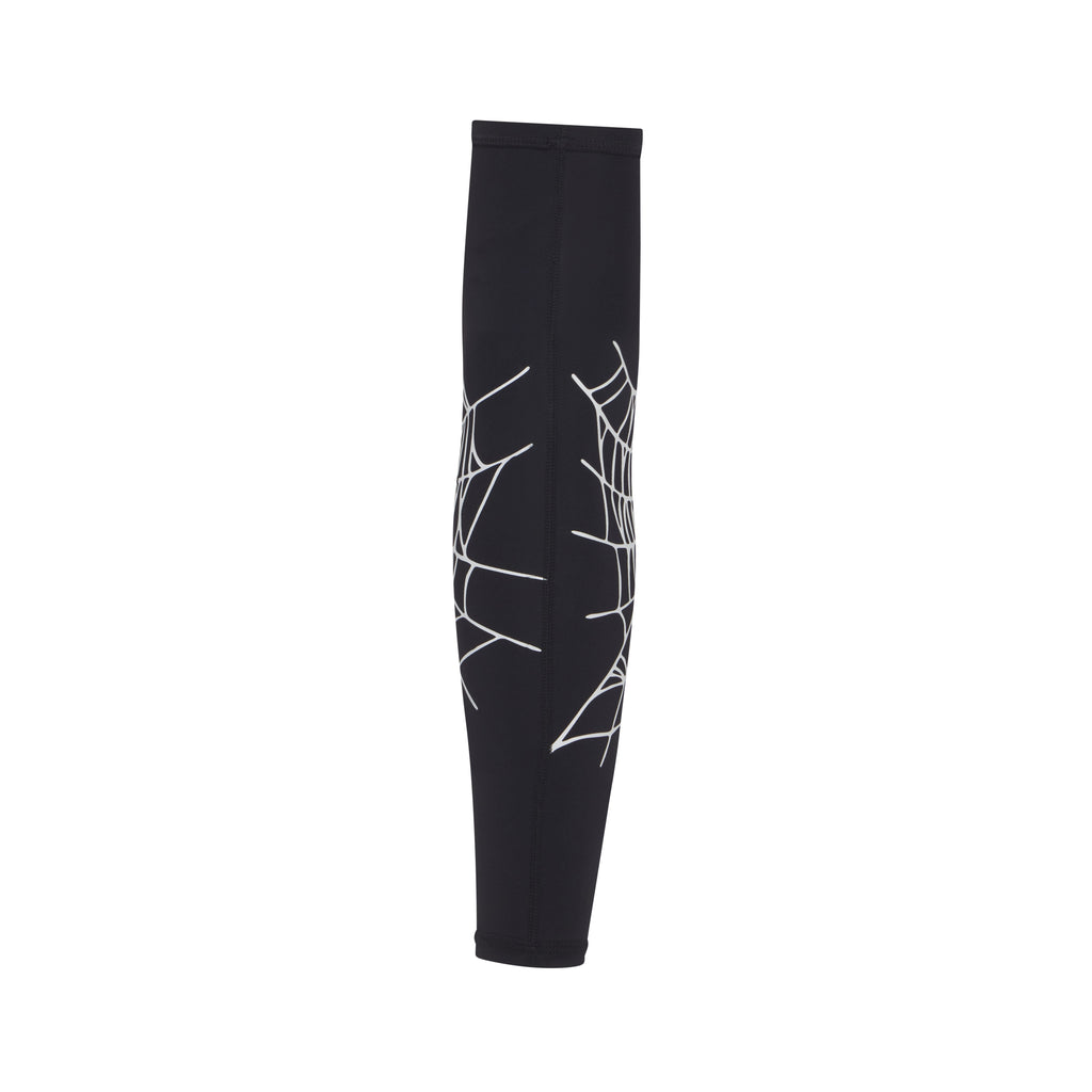 Black compression shooting sleeve made of breathable fabric with a white web graphic print and signature logo detail.