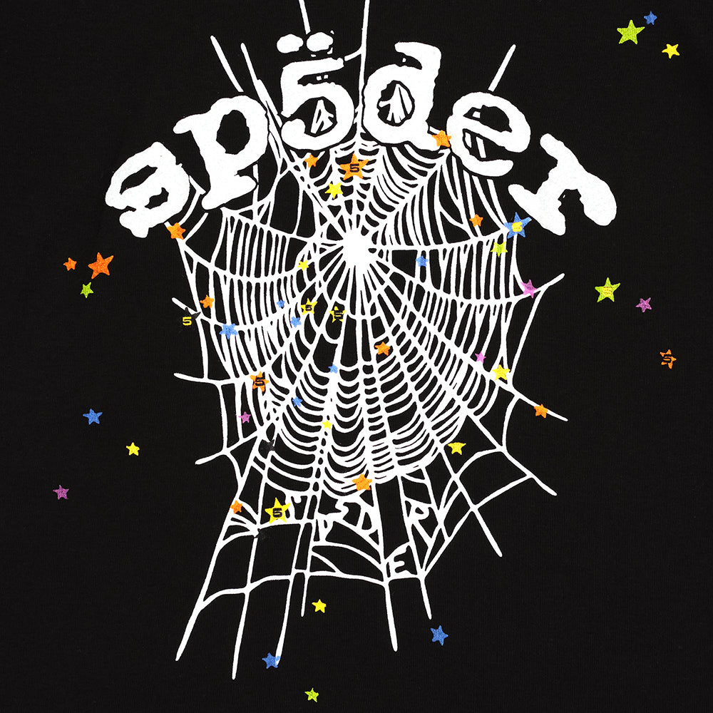 Black OG WEB V2 BABY TEE with white spider web graphic and colorful stars.