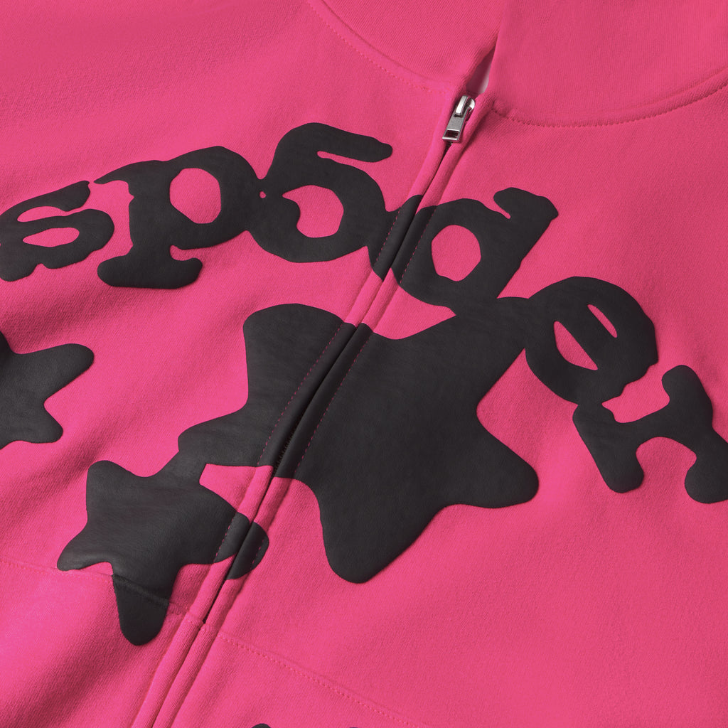 Pink 13oz cotton fleece Beluga zip-up hoodie with black puff print design and silver zipper.