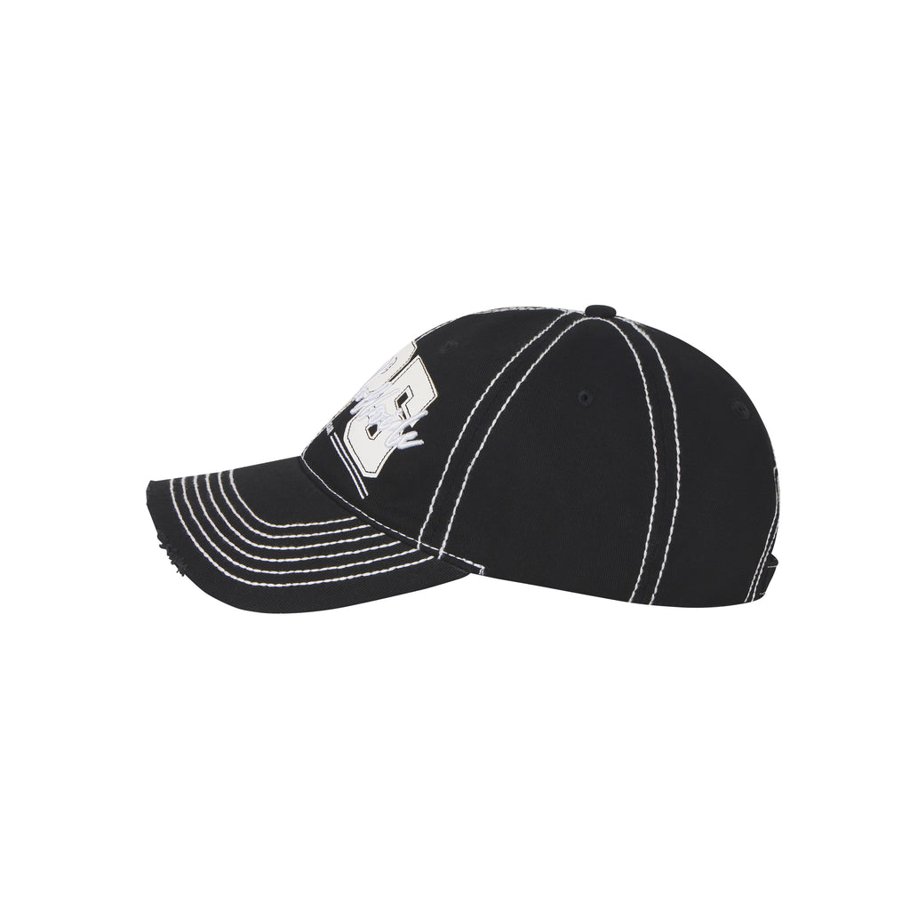 Black denim baseball cap with white contrast stitching, layered logo appliqué, and a distressed curved brim.