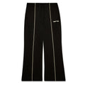Black poly blend G550 track pant with elastic waist, contrast piping, SP5 logo, and wide leg.