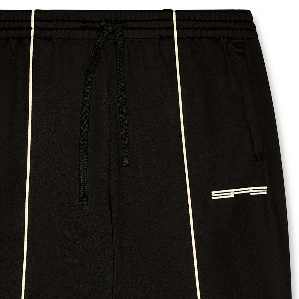 Black poly blend G550 track pant with elasticized waistband, contrast piping, and SP5 logo.
