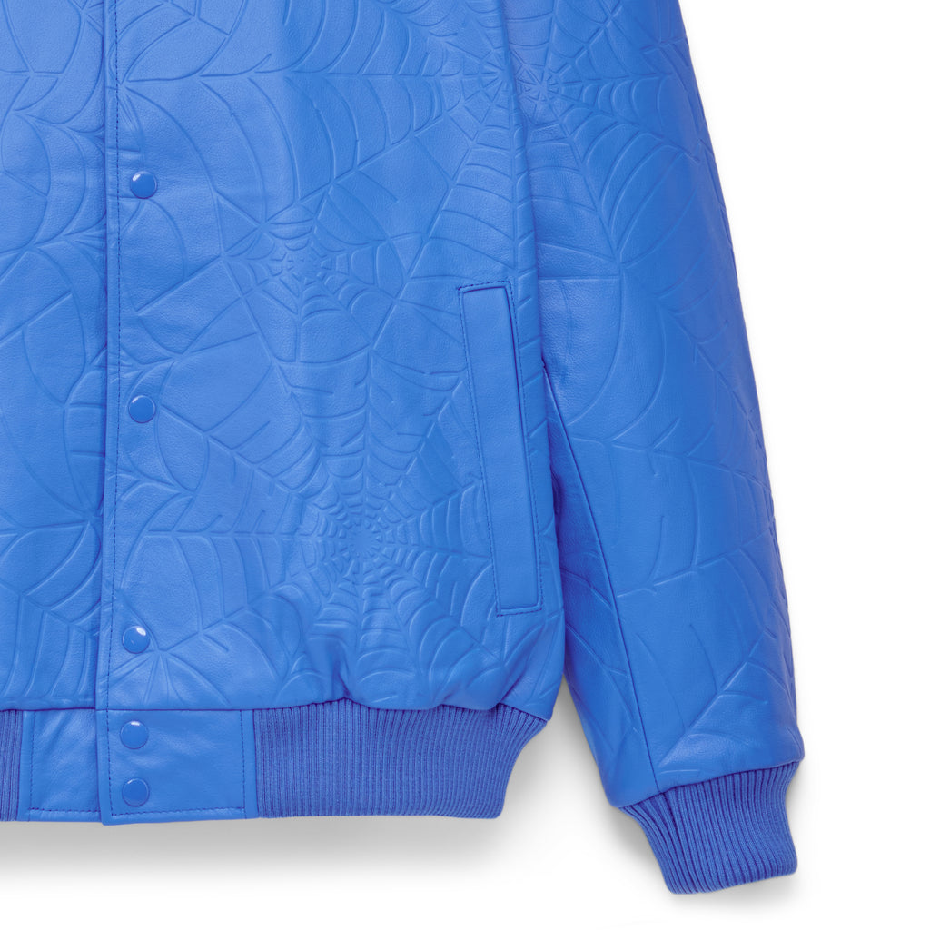 Blue cowskin leather jacket with debossed web design, press-stud closure, and ribbed cuffs.