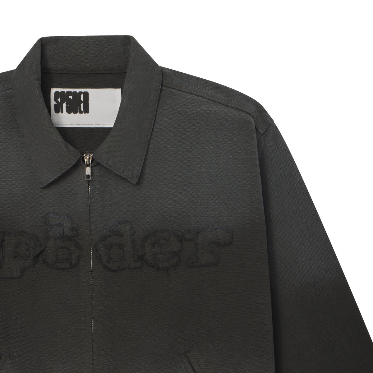 Distressed black 13oz canvas zip-up work jacket with frayed SP5DER graphic embroidery and a boxy silhouette.