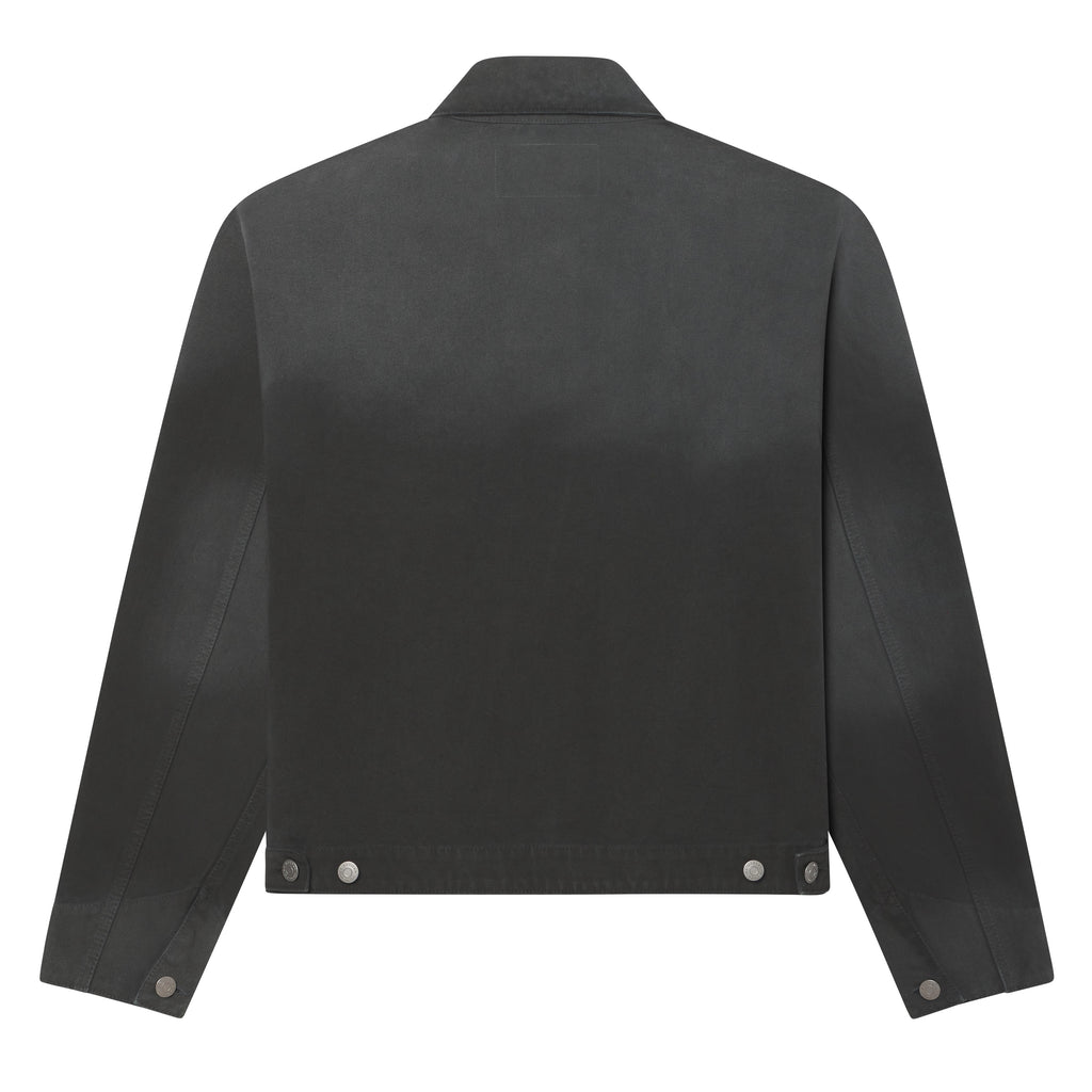 Back view of a black distressed 13oz canvas work jacket with a boxy fit, button cuffs, and adjustable waist tabs.