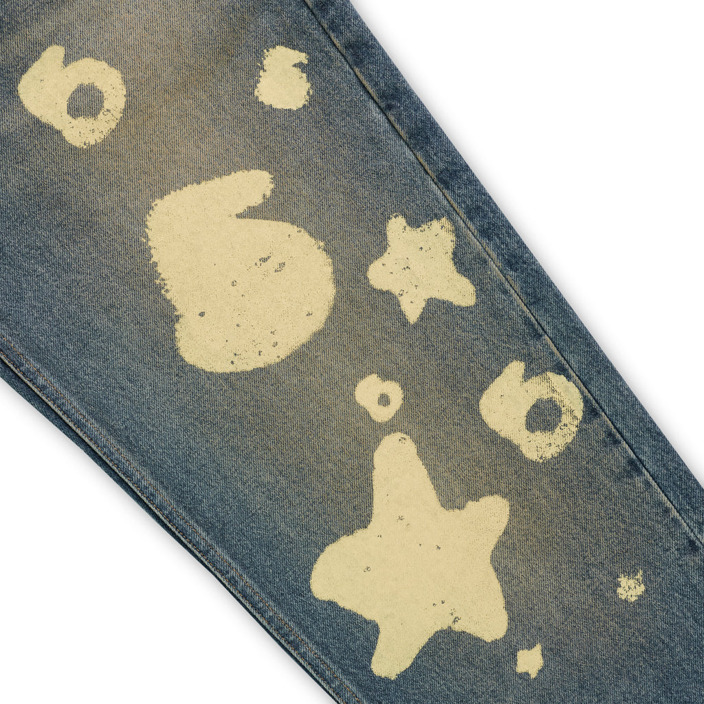 BELUGA STAMP DENIM blue jeans with unique light yellow stamp designs and a classic straight leg fit.