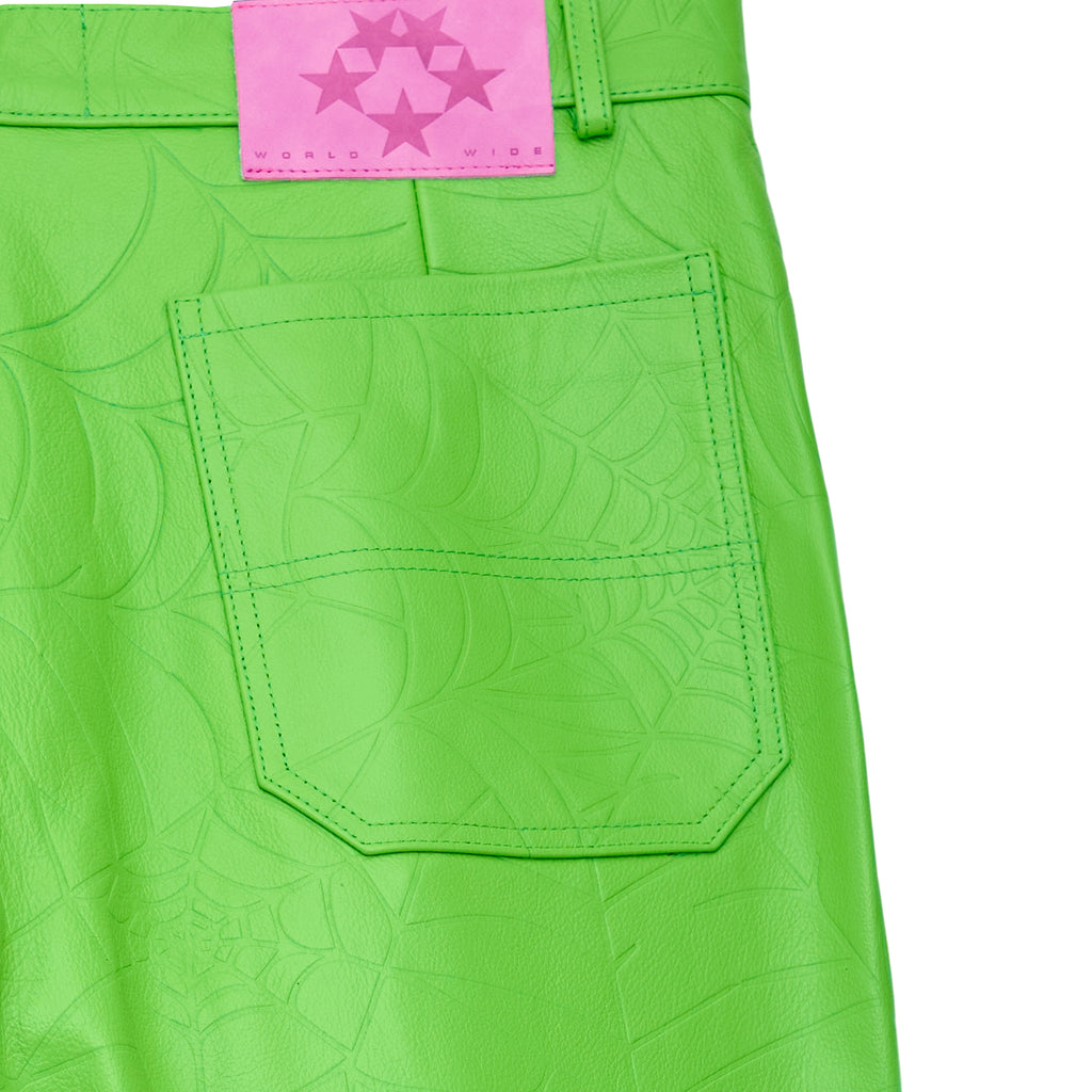 Lime green debossed web cowskin leather pant with pink suede logo patch and back pocket.