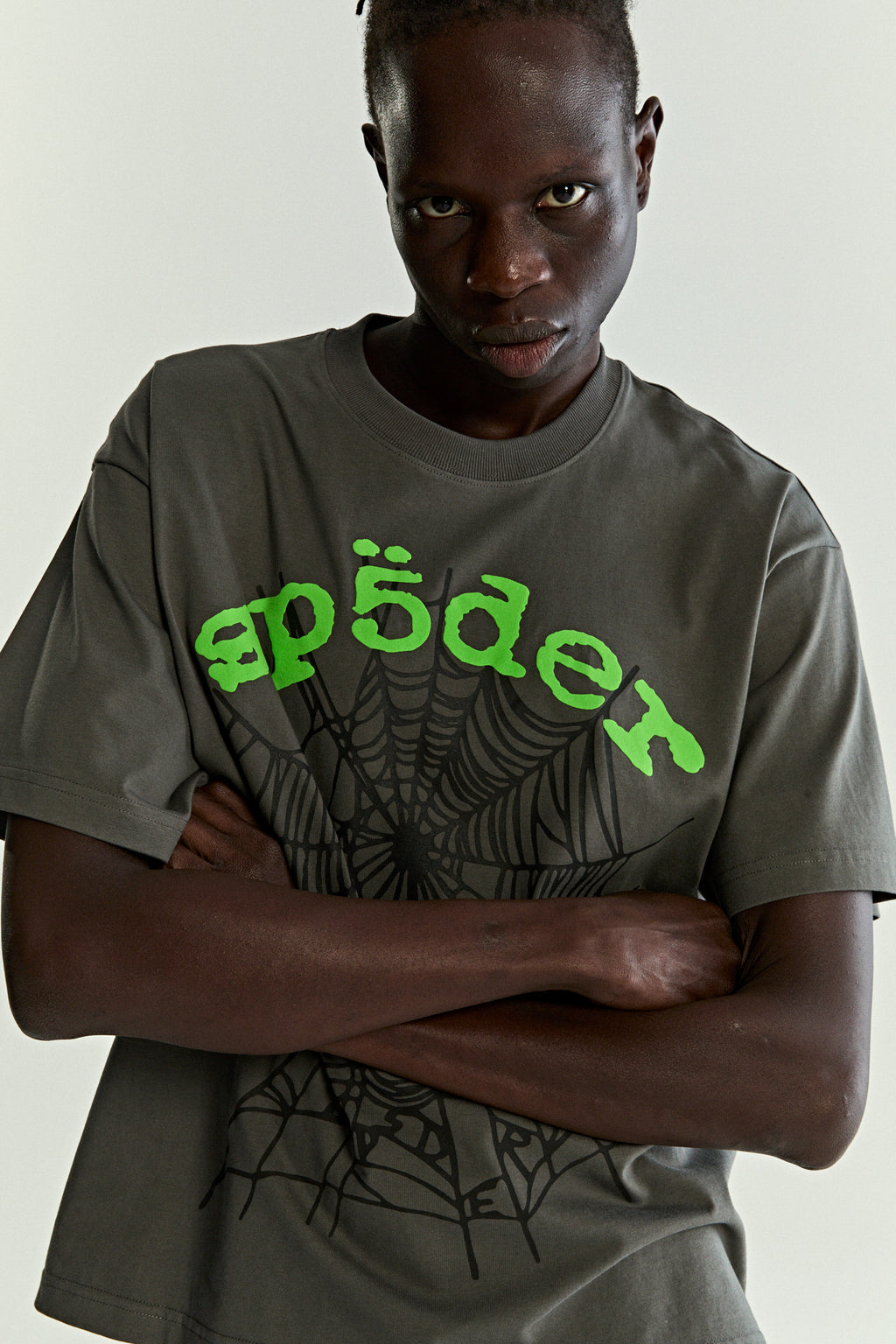 Dark gray cotton OG WEB V2 TEE with green "sp5der" text and spiderweb graphic.