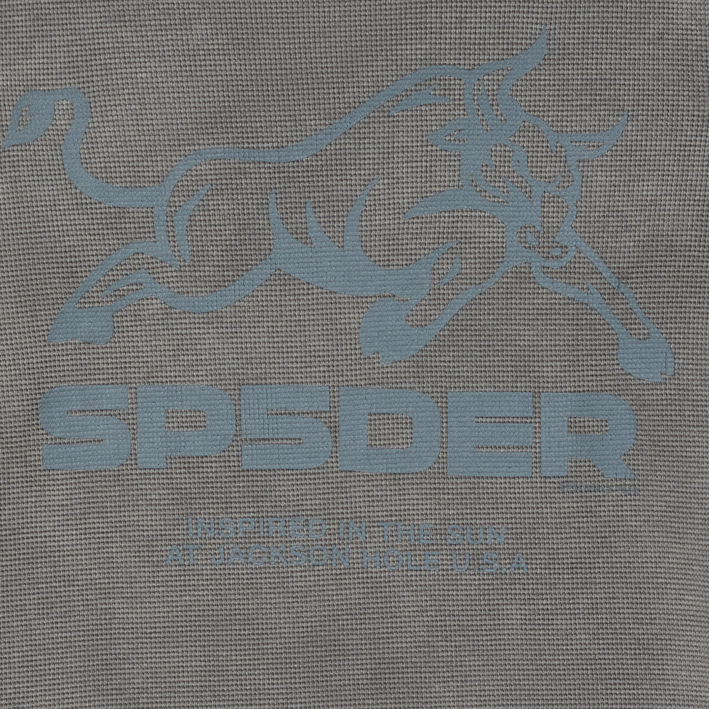Close-up of GREY BULL THERMAL LS, showing grey waffle fabric with a light grey bull logo and "SPYDER" text.