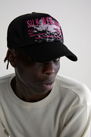 BLACK SILK WEB BANK TRUCKER ON MODEL