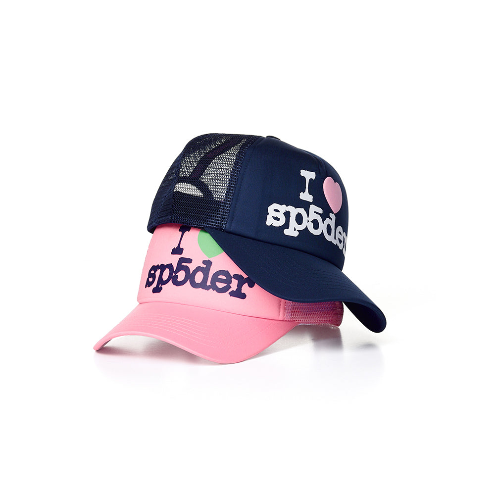 Two 5-panel polyester trucker hats: one navy with white "I ♥︎ sp5der" graphic, one pink with navy "I ♥︎ sp5der" graphic.