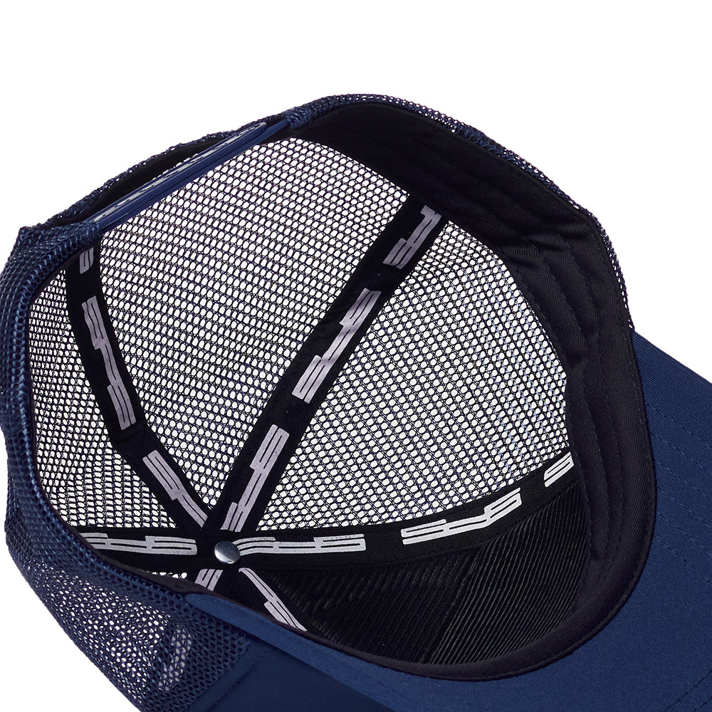Navy blue polyester trucker hat, interior view showing mesh back and 5-panel design.
