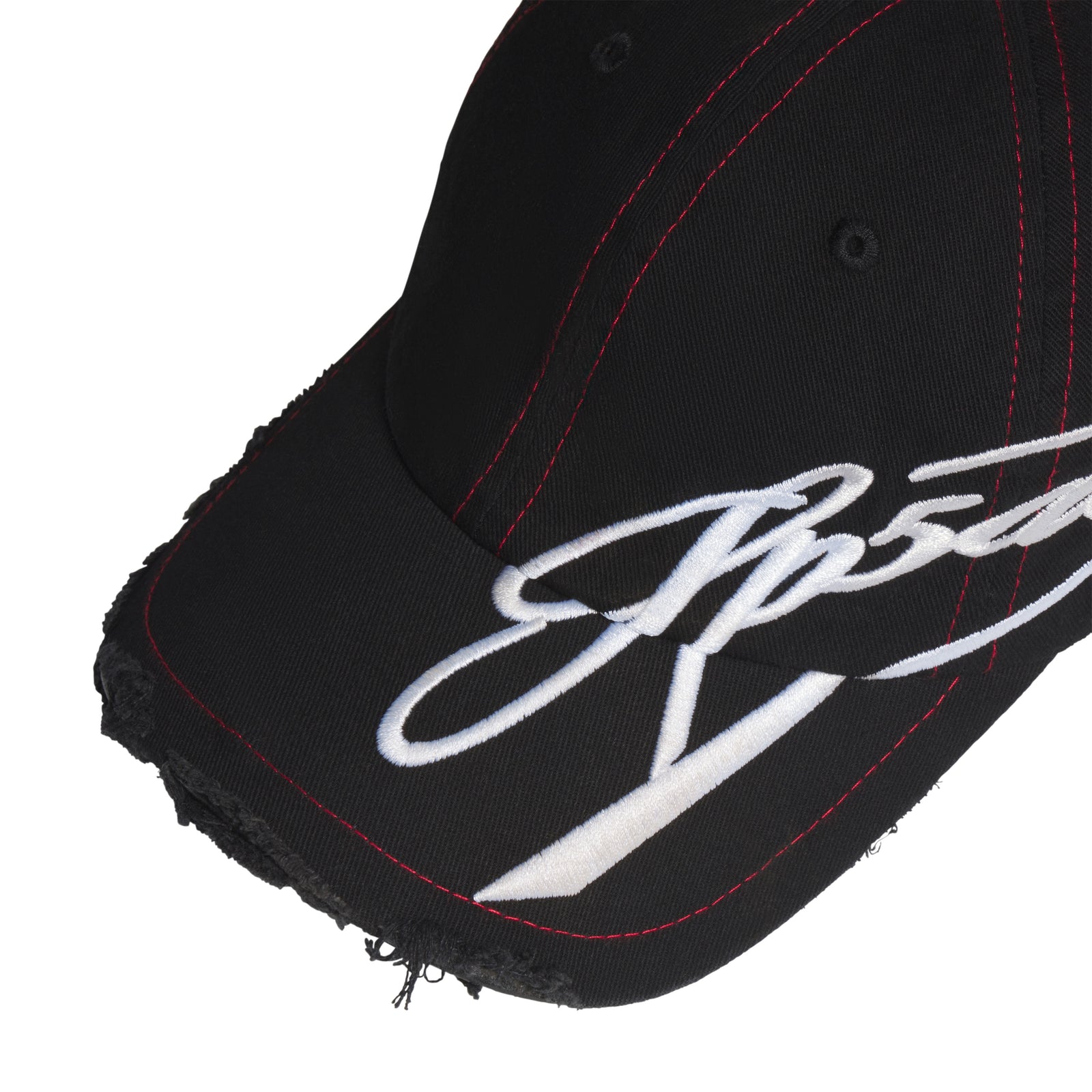 Black baseball cap with red stitching, a curved brim, distressed edges, and white cursive graphic embroidery.