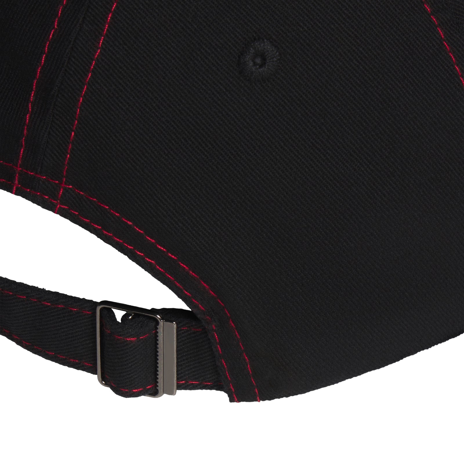 Black baseball cap with red contrast stitching and an adjustable metal buckle strap closure.