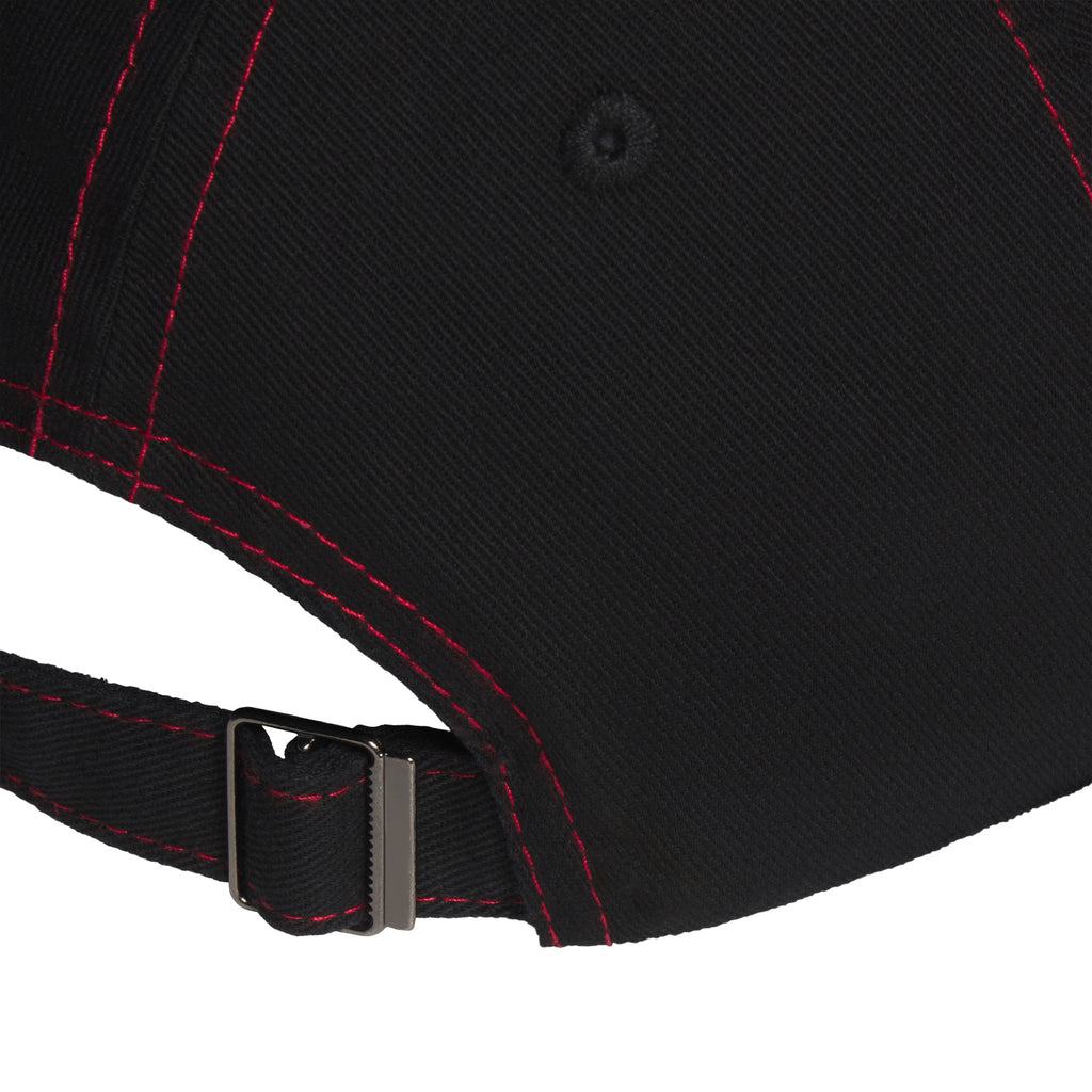 Black baseball cap with red contrast stitching and an adjustable metal buckle strap closure.