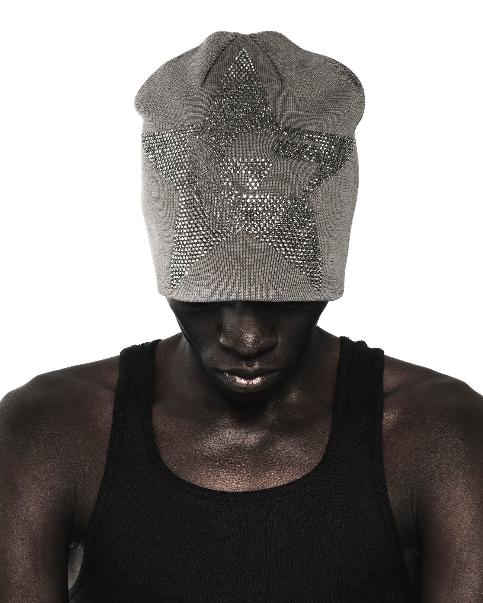 Gray acrylic skully beanie with a large, sparkly rhinestone star design covering the eyes.