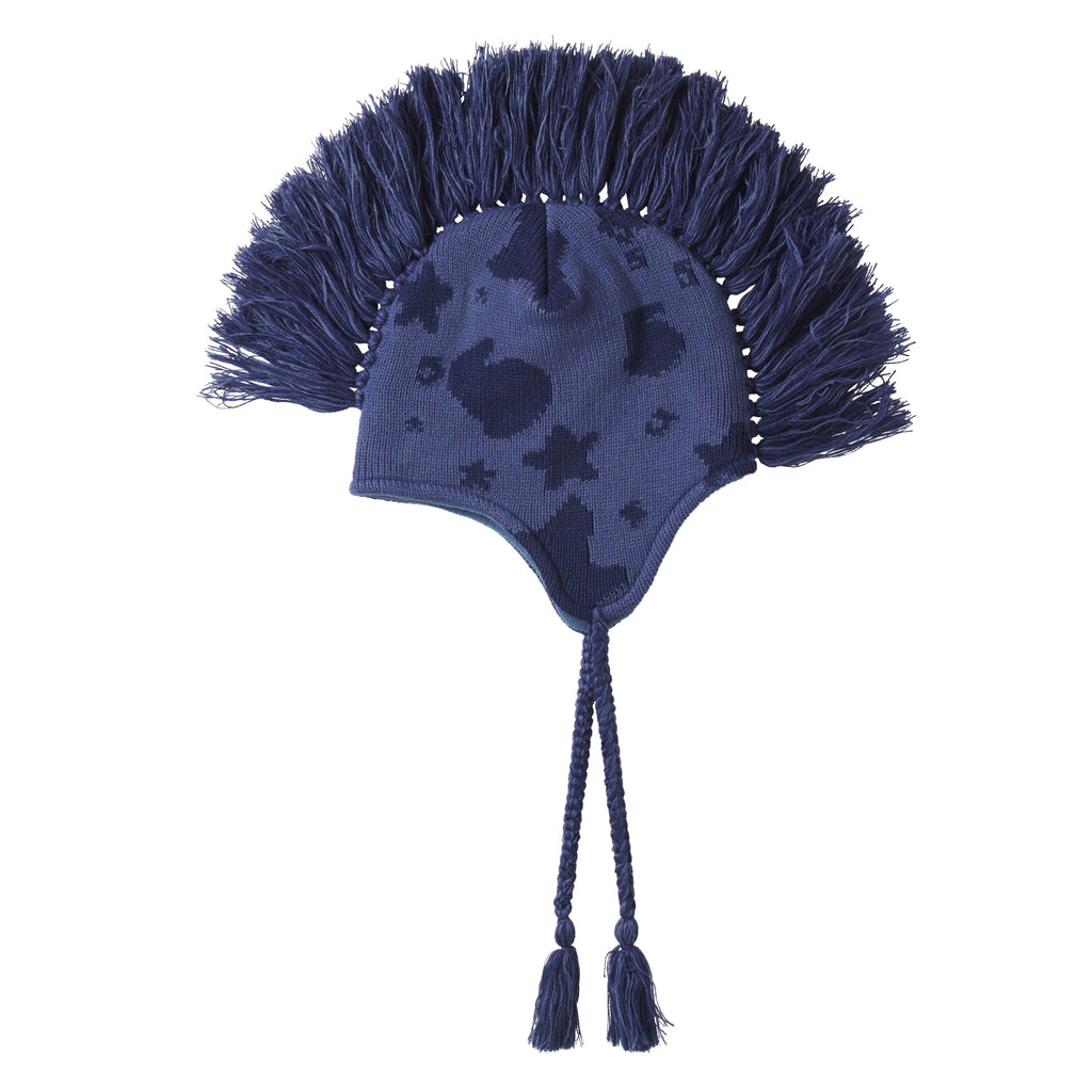 Blue knit hat with beluga graphic print, mohawk fringe crown, and ear flaps with braided tie cord tassels.