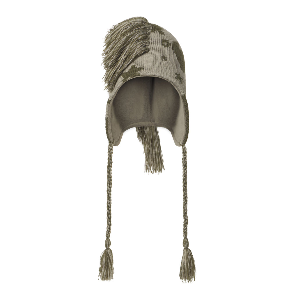 Beige knit hat with a beluga graphic print, mohawk fringe crown, ear flaps, and braided tie cords with tassels.