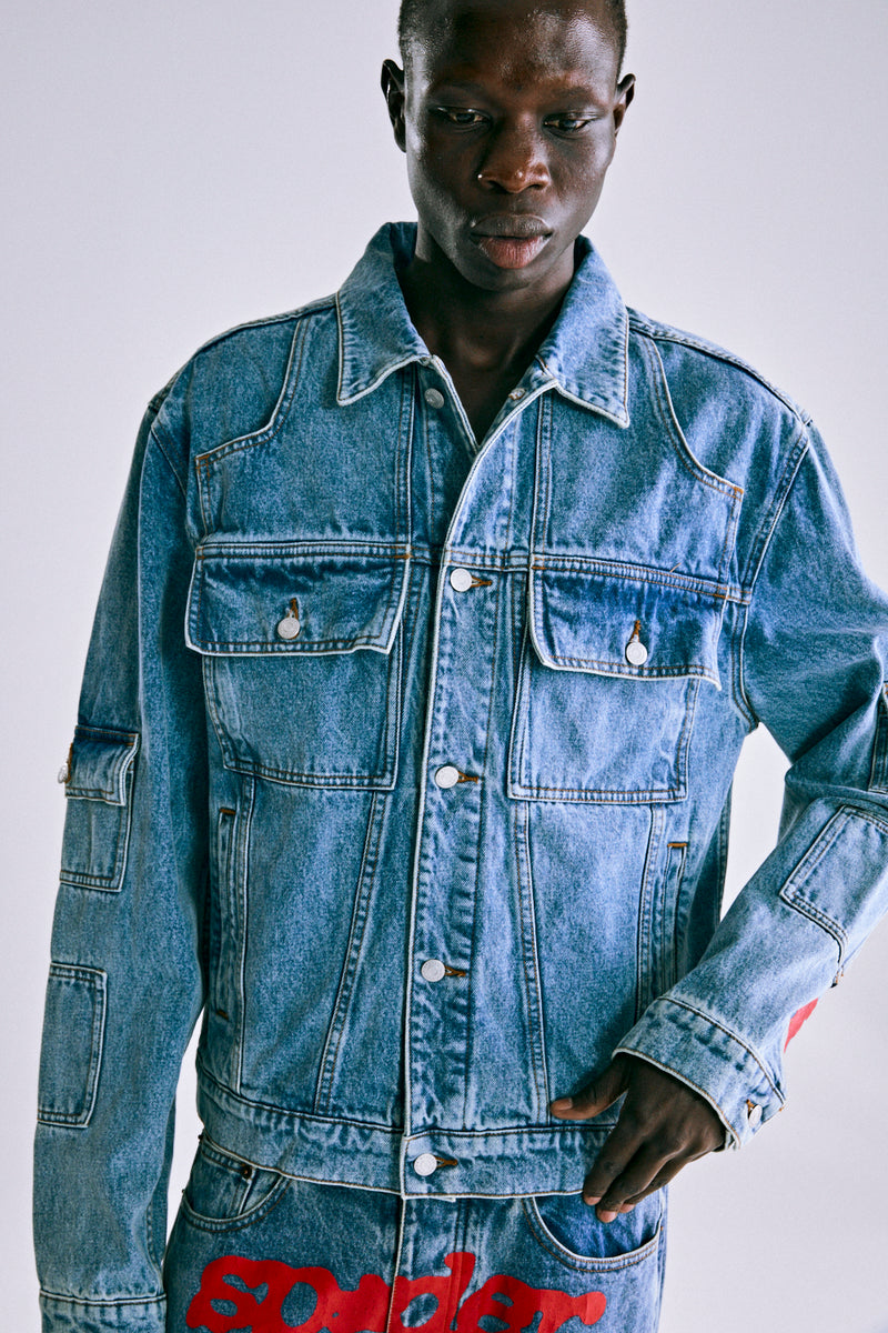 LIGHT WASH DENIM V3 TRUCK JACKET ON MODEL