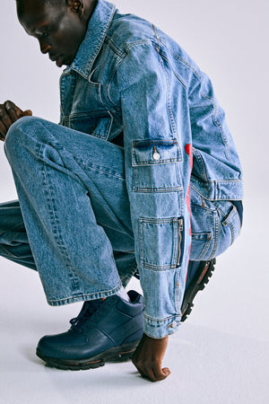 LIGHT WASH DENIM V3 TRUCK JACKET ON MODEL