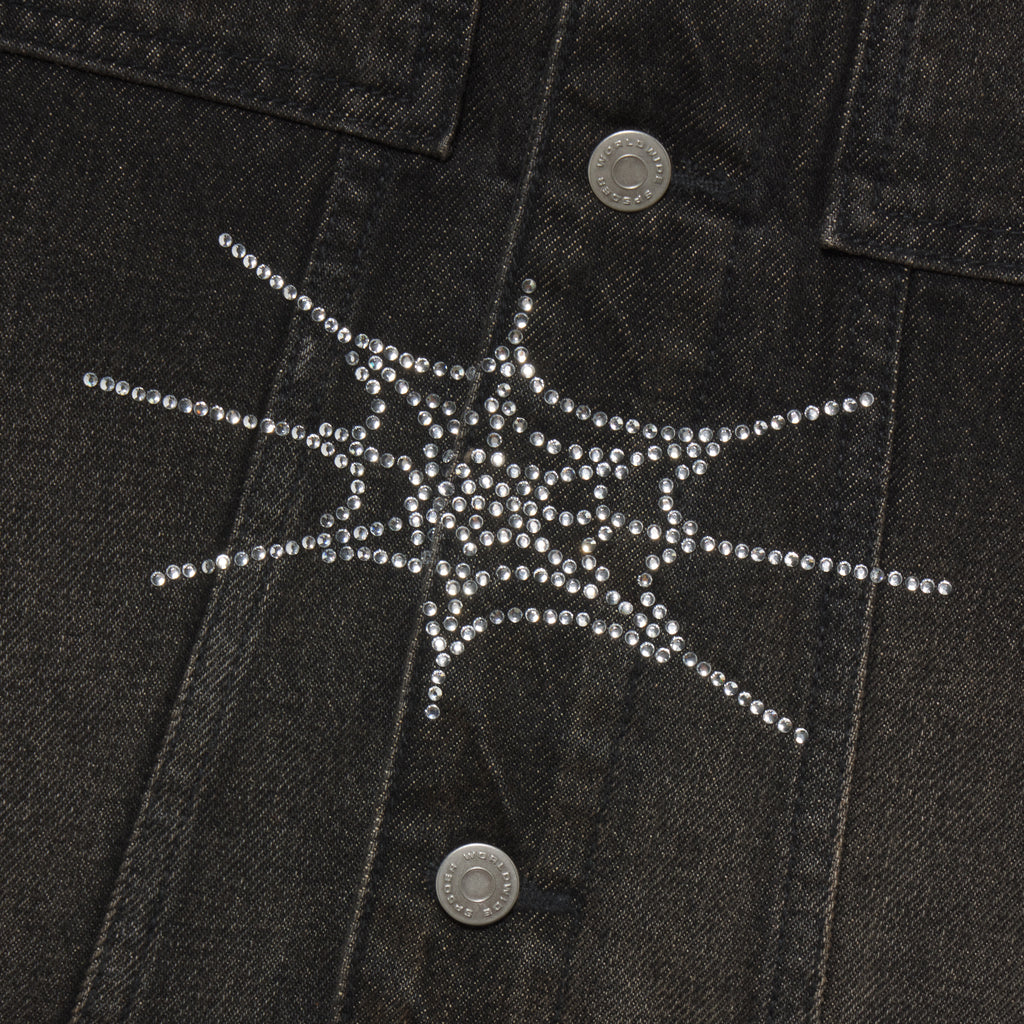 Black denim jacket featuring a sparkling rhinestone web graphic design and silver button closures.
