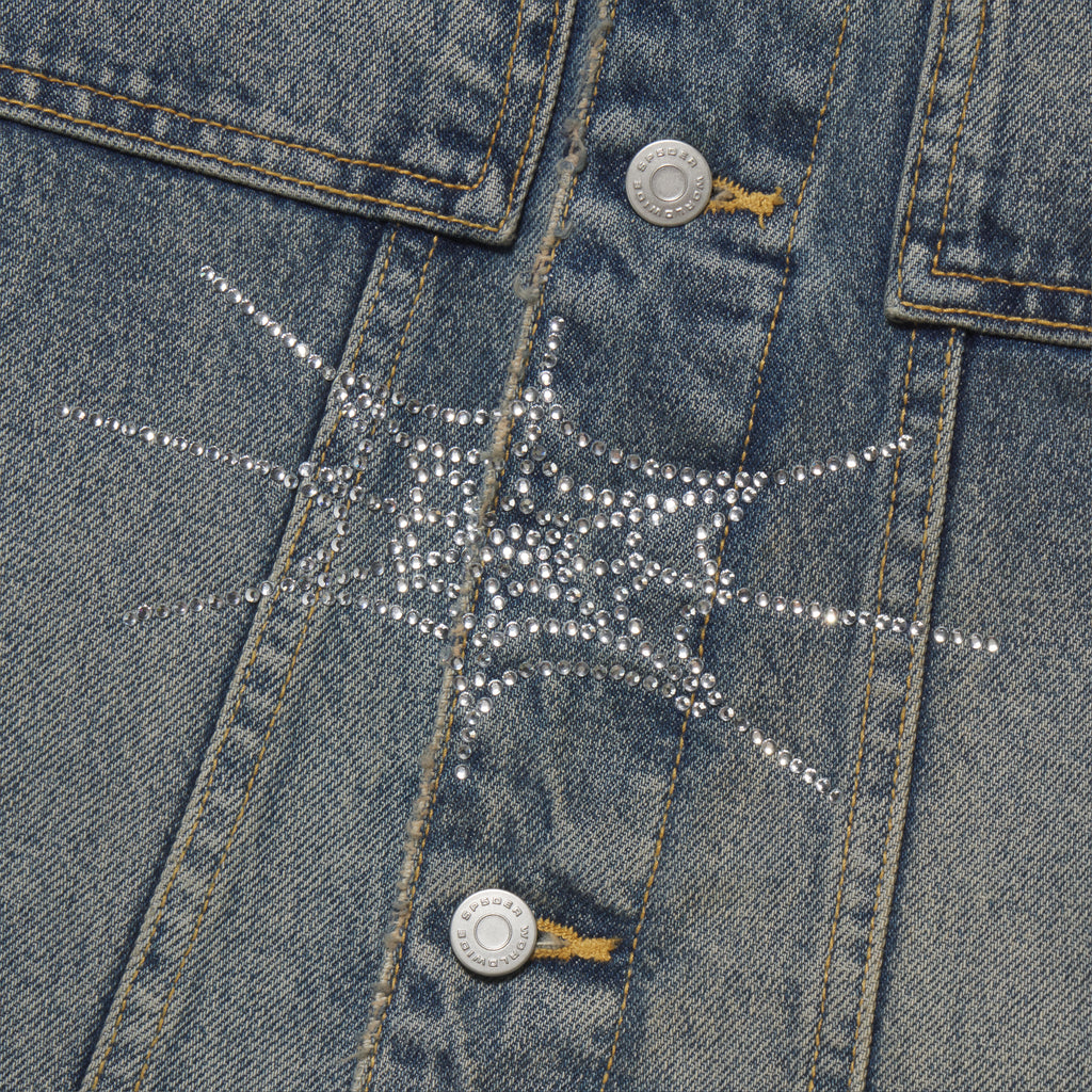 Blue denim jacket featuring a sparkling silver rhinestone web graphic print and branded silver button closures.
