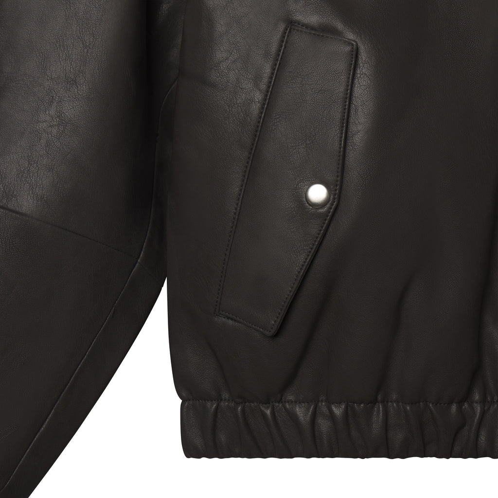 Black faux leather hooded jacket featuring a snap-button flap pocket and an elasticated hem.