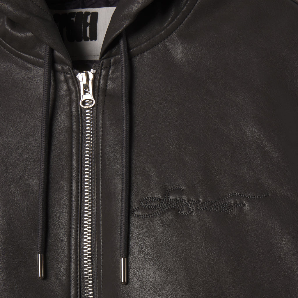 Black faux leather hooded jacket featuring a front zipper, drawstring hood, and tonal SP5DER graphic design on the chest.