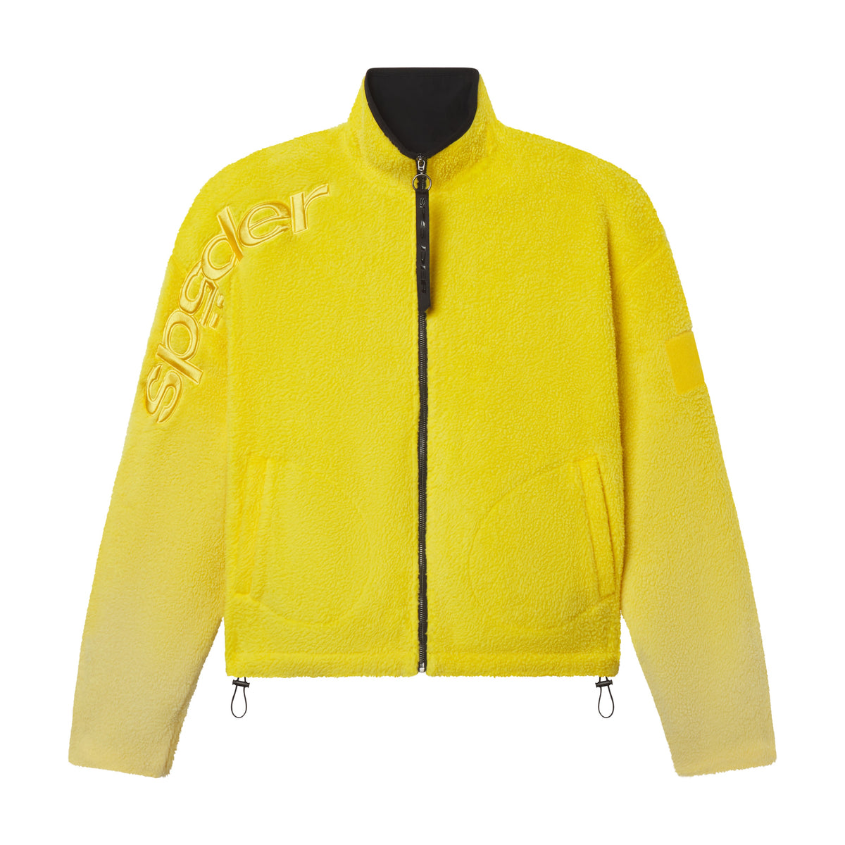 Bright yellow oversized fleece jacket with a stand collar, full-zip front, and tonal SP5DER graphic embroidery on the sleeve.