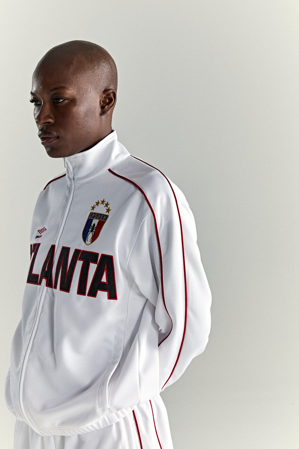 WHITE ATLANTA TRACK JACKET ON MODEL