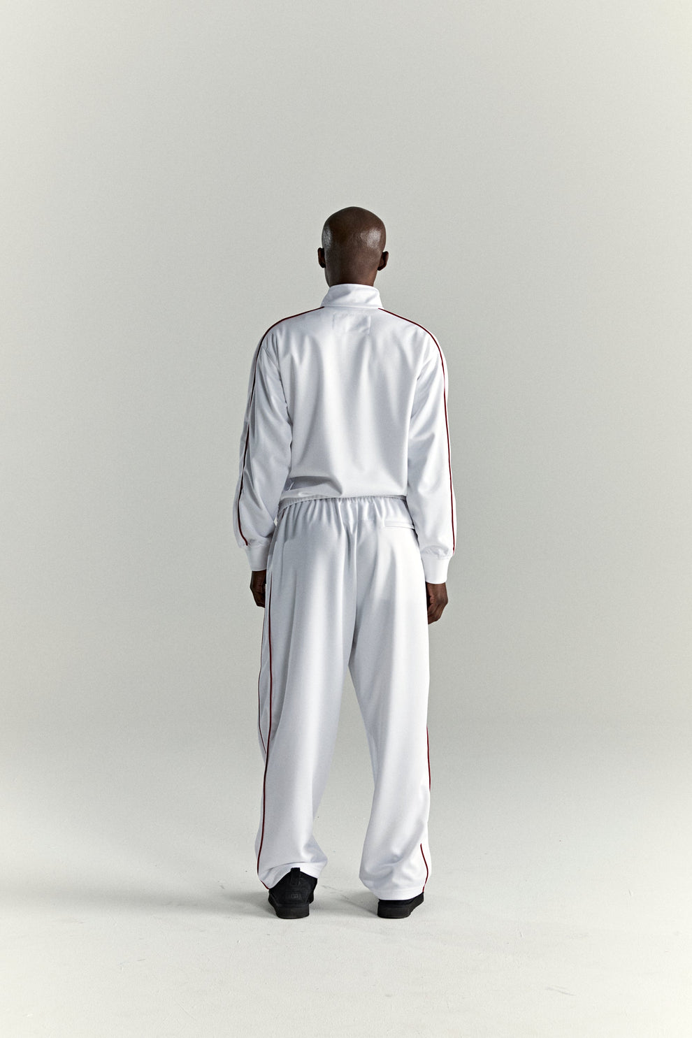 WHITE ATLANTA TRACK JACKET ON MODEL