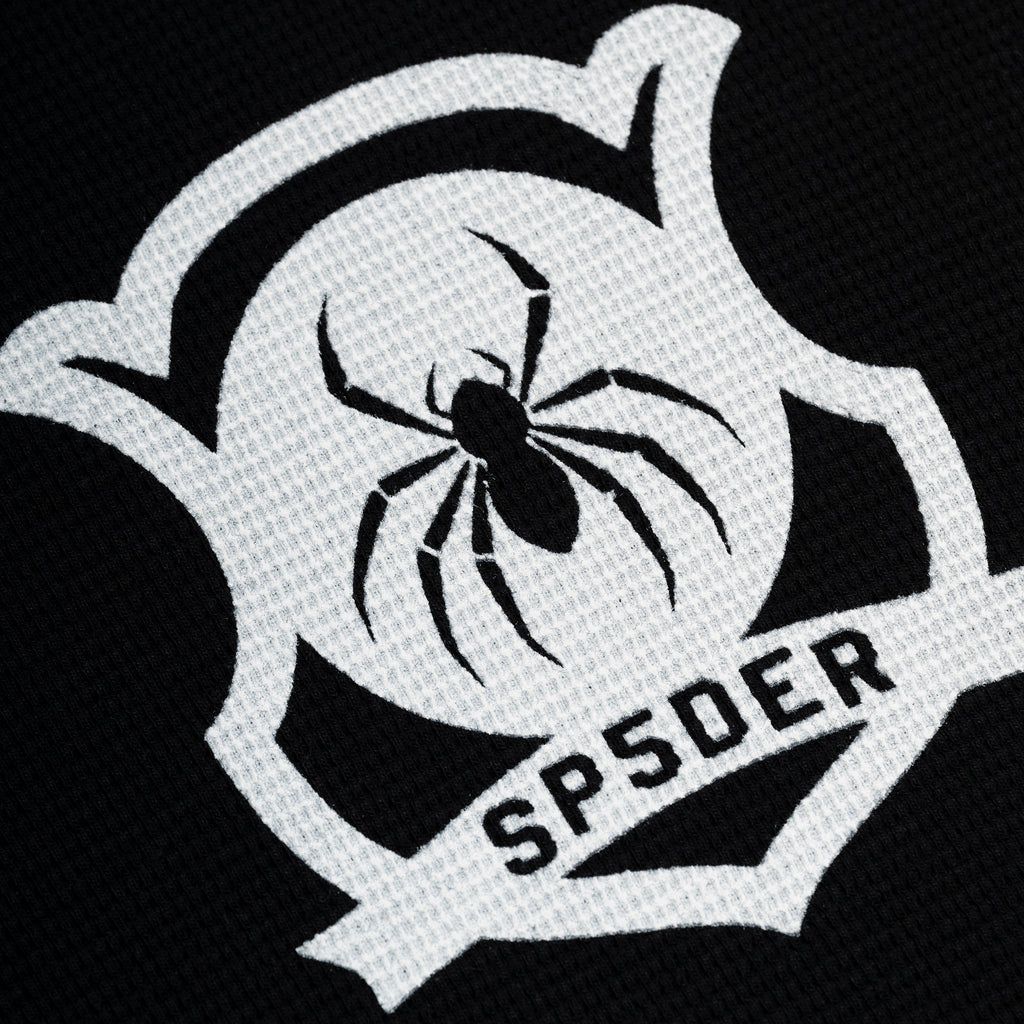 Black waffle knit thermal with white shield graphic featuring a black spider and "SPSDER" text.
