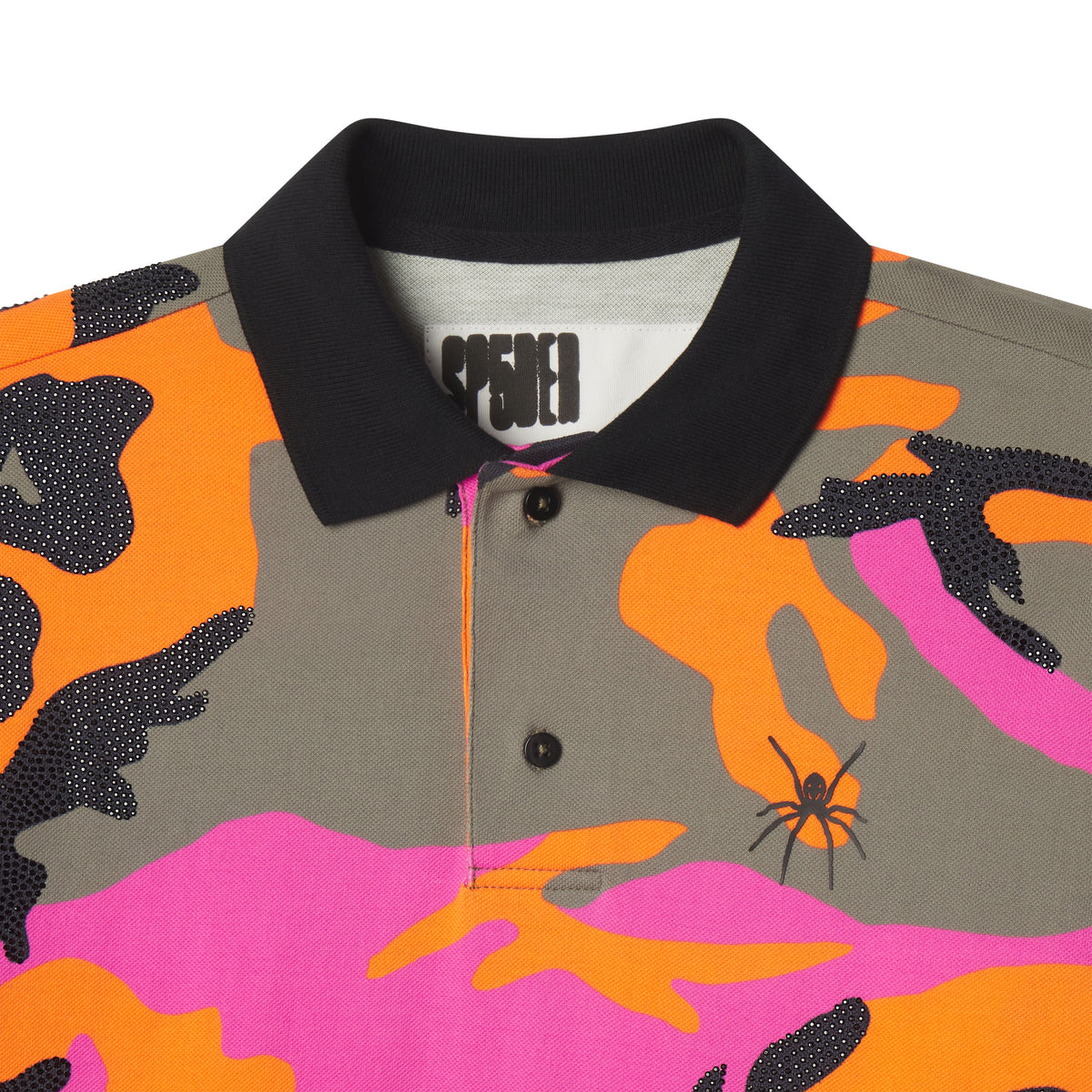Cotton polo shirt with orange, pink, and grey camo graphic print, black rhinestone accents, and a black rib-knit collar.