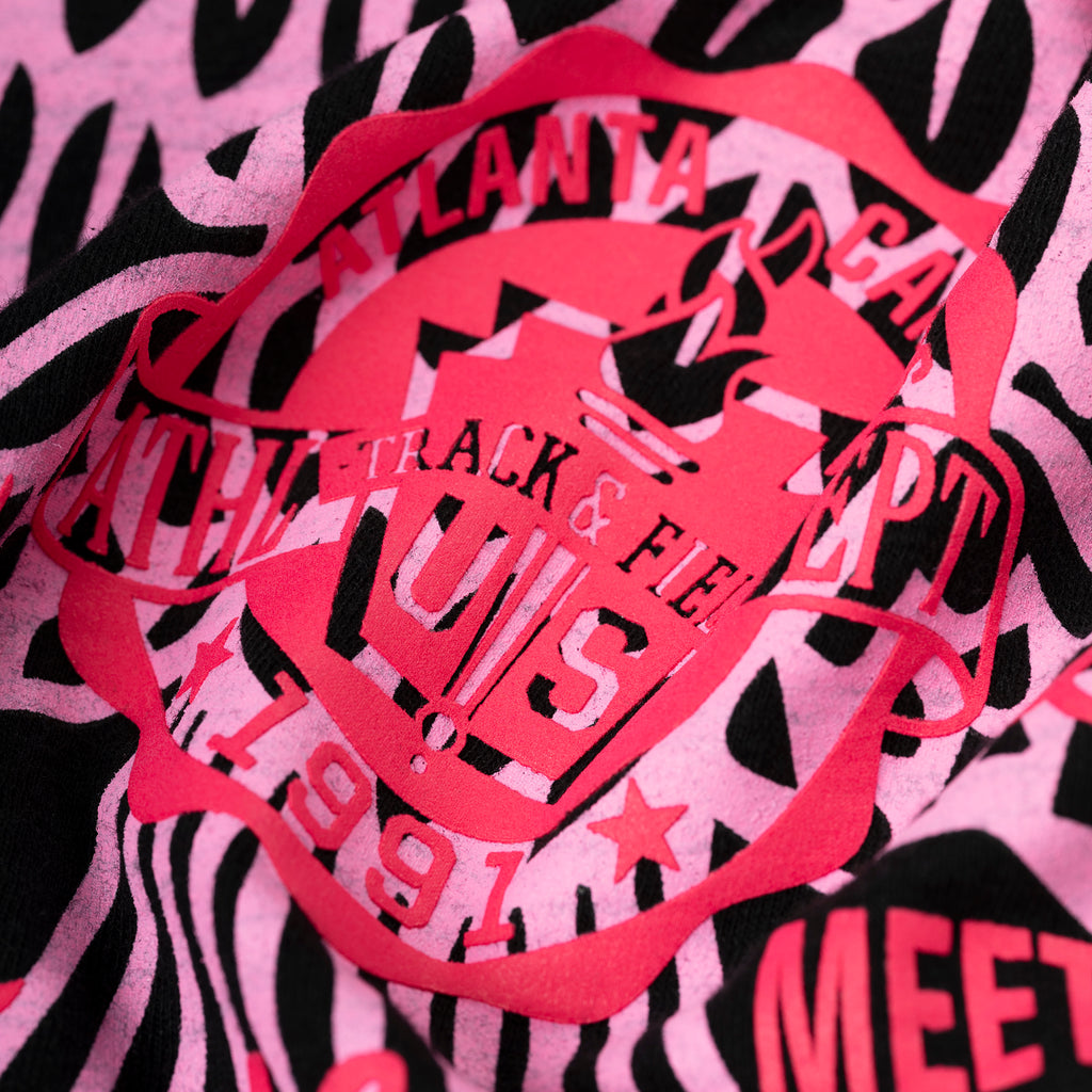 Pink and black slub jersey tee with "Atlanta Track & Field" graphic print.