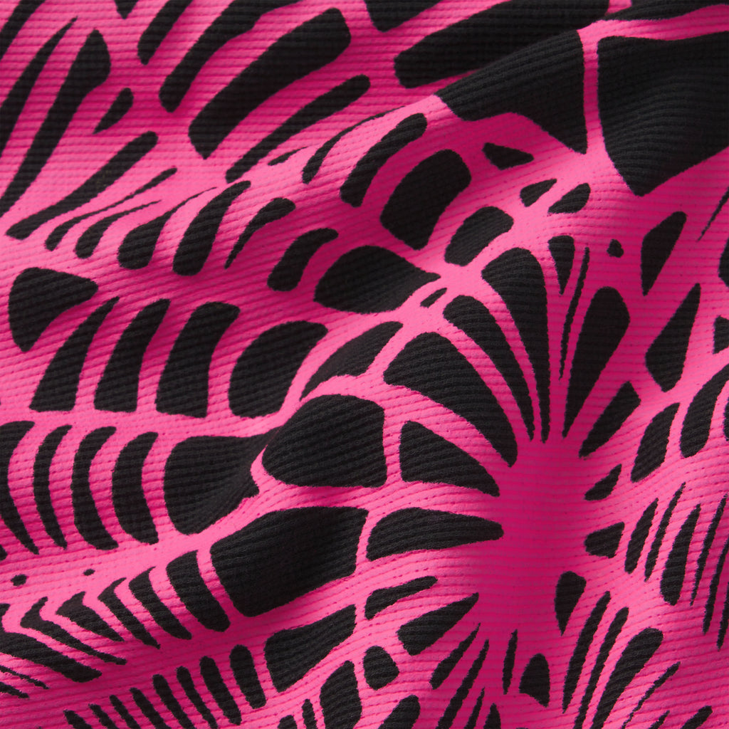 Waffle knit thermal fabric featuring a bold black and hot pink abstract graphic print with a textured ribbed finish.