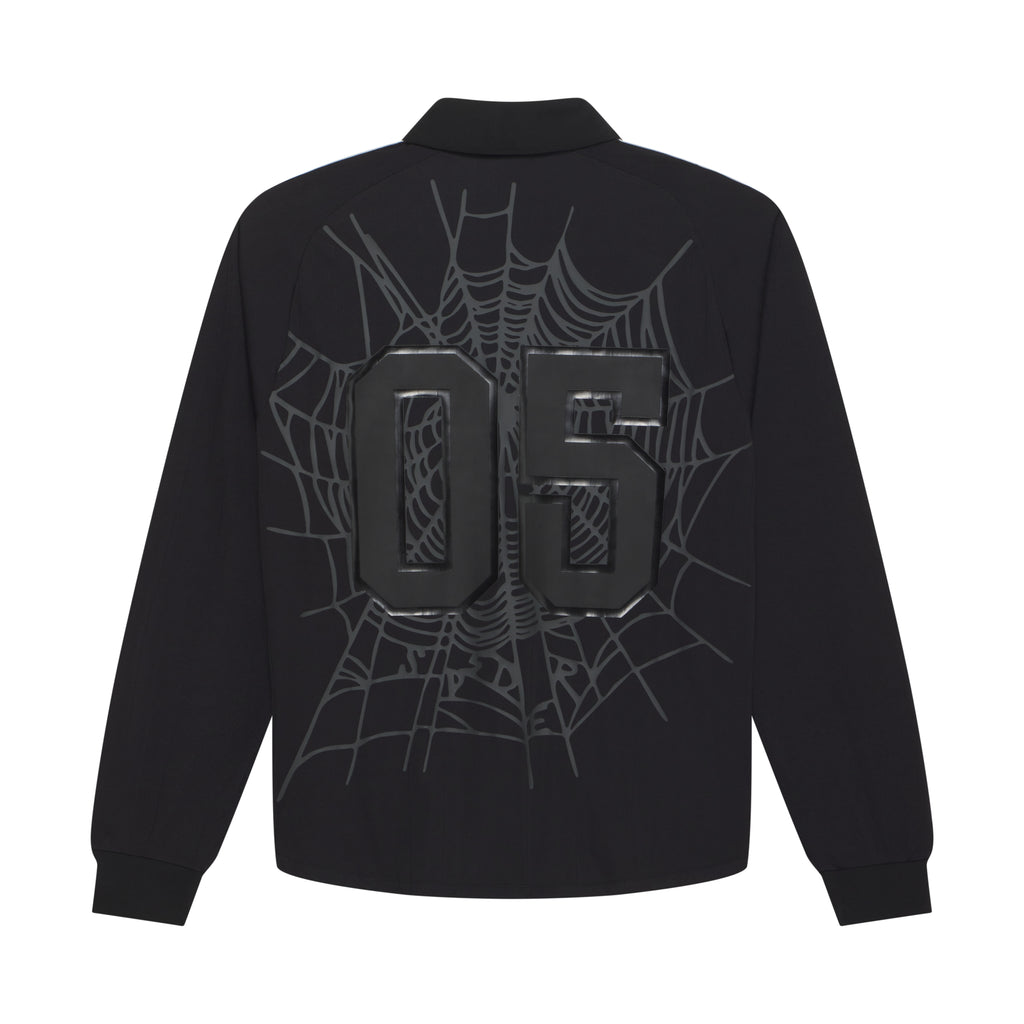Black polyester SP5DER long sleeve jersey with reflective "05" appliqué and tonal web graphic print on back.