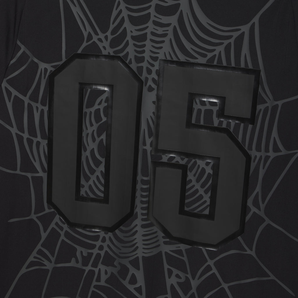 Black polyester SP5DER FOOTBALL JERSEY with raised "05" appliqué and tonal web graphic design on back.