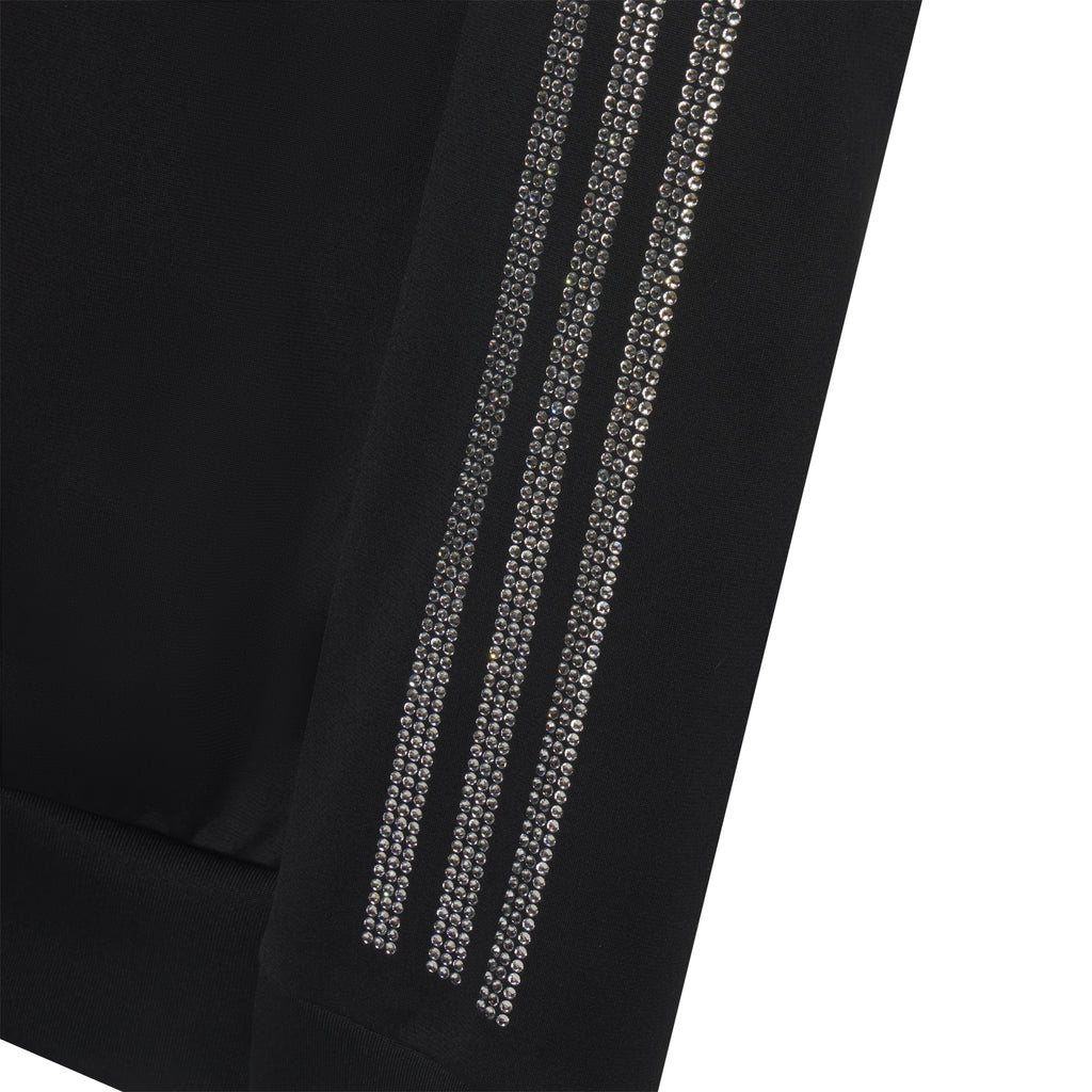 Black polyester SP5DER track top with rhinestone adidas 3-Stripes graphic design on the sleeve.