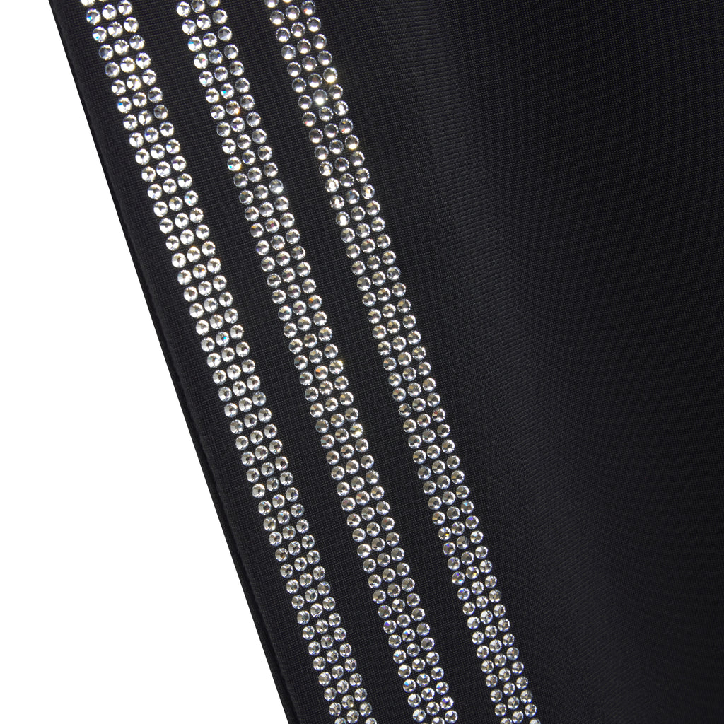 Black polyester track pant with rhinestone adidas 3-Stripes graphic design.
