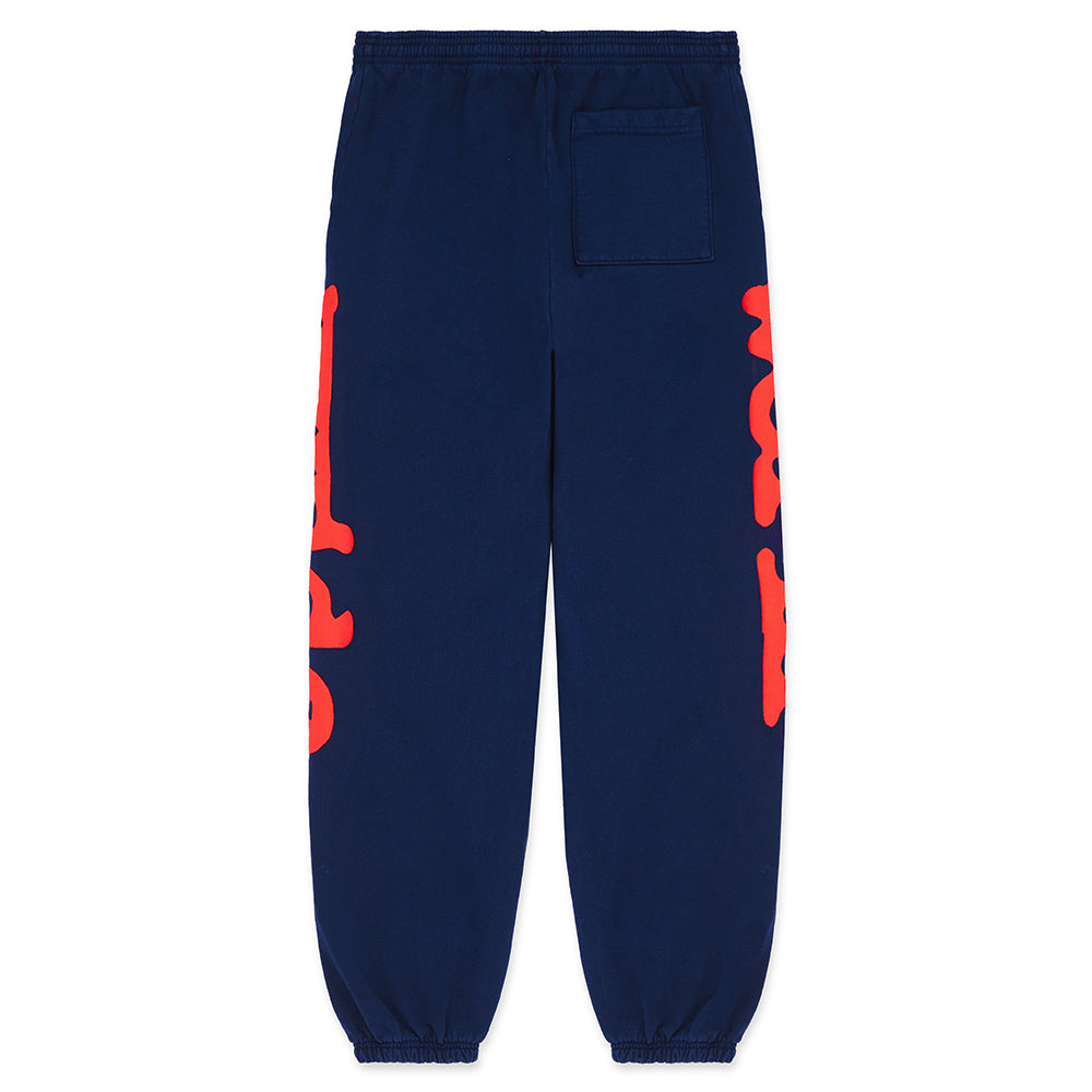 Navy BELUGA SWEATPANT with red "Worldwide" puff/discharge print down both legs.
