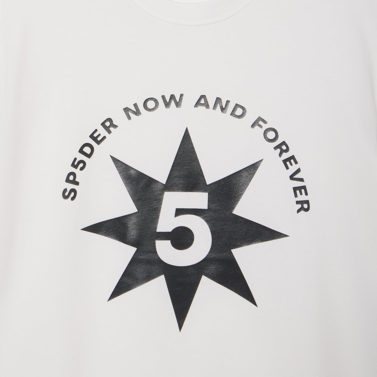 White 100% cotton tee featuring a black star graphic print with a number 5 and Now and Forever text on the front.