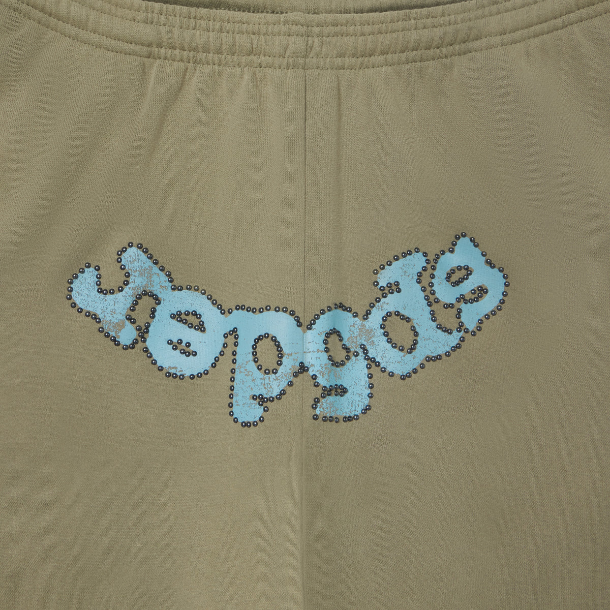 Olive green 13oz cotton fleece sweatpants featuring a faded blue OG logo graphic with metallic stud detailing.