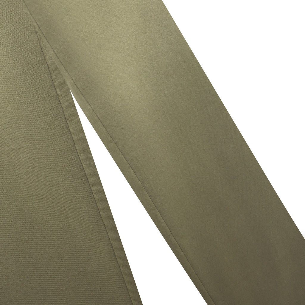 Olive green 13oz cotton fleece sweatpants with a faded wash finish and wide-leg silhouette.