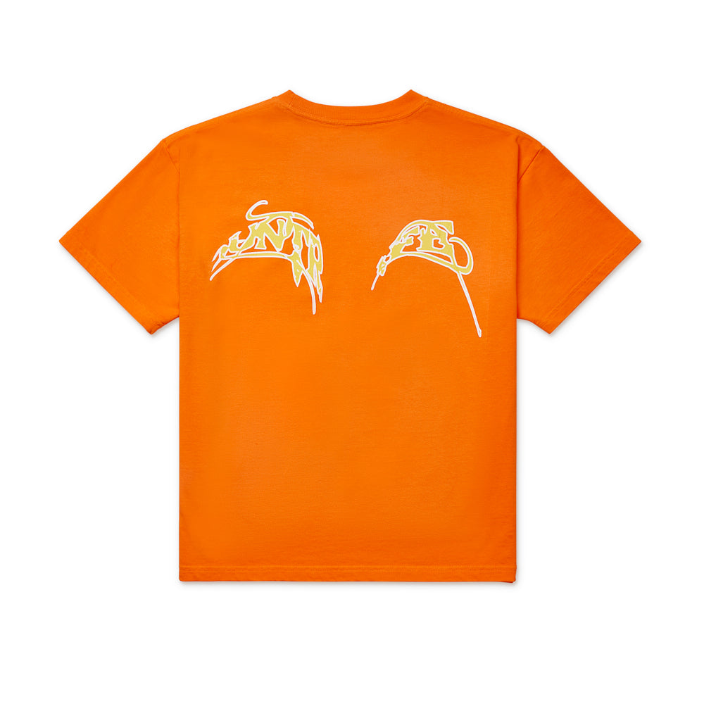 Orange 100% cotton tee with a white and yellow graphic print on the back.