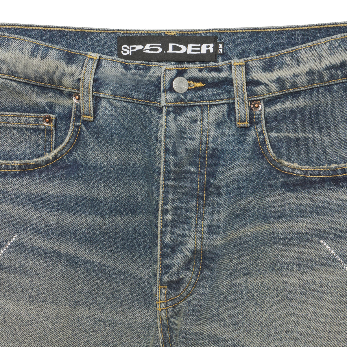 Faded blue 13oz denim jeans with rhinestone web graphic design, branded hardware, and SP5DER leather waist patch.